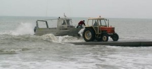 La vedette et le tracteur